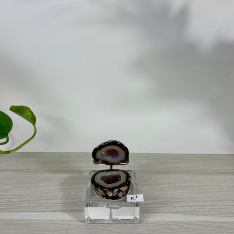 Open Druzy Mermaid Box featuring a dark banded agate geode with sparkling crystals on a clear acrylic display stand.