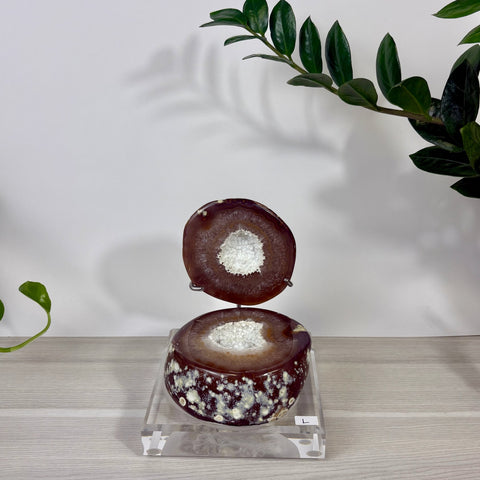 Large size Druzy Mermaid Box featuring a deep brown agate geode with a sparkling white crystal center on a clear acrylic stand.
