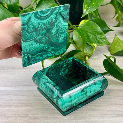 Handcrafted square malachite jewellery box with vibrant green swirling patterns and a polished finish.