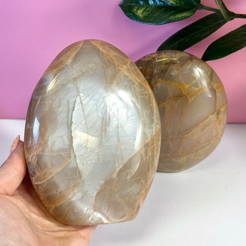 Peach Moonstone free form crystal, showing iridescent peachy-brown hues and natural cracks.