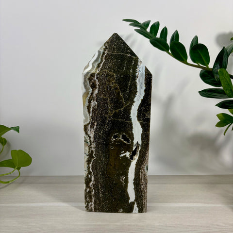 XXXL Sea Jasper tower with dark green, brown, and white banded patterns and a small natural crystal geode cavity.