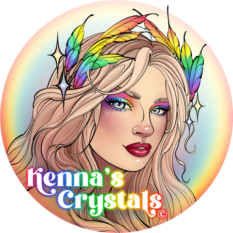 Blonde woman with rainbow feather crown, vibrant eye makeup, and "Kenna's Crystals" text on a rainbow background.