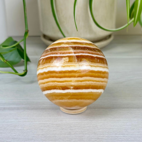 Candy Corn Calcite Sphere 77 1 - Kenna's Crystals from TikTok