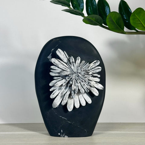 Black chrysanthemum stone free form with white floral pattern, natural crystal decor.