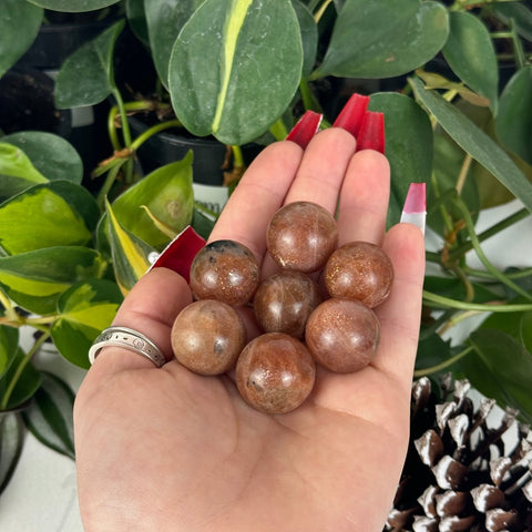 Cinnamon Sunstone Sphere 11 2 - Kenna's Crystals from TikTok
