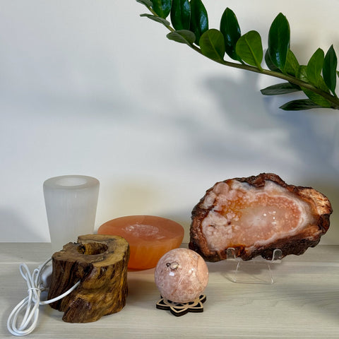 Kenna's Heart "Broken" Bundle G: Pink geode slice, wooden candle holder, pink crystal sphere, and white vase.