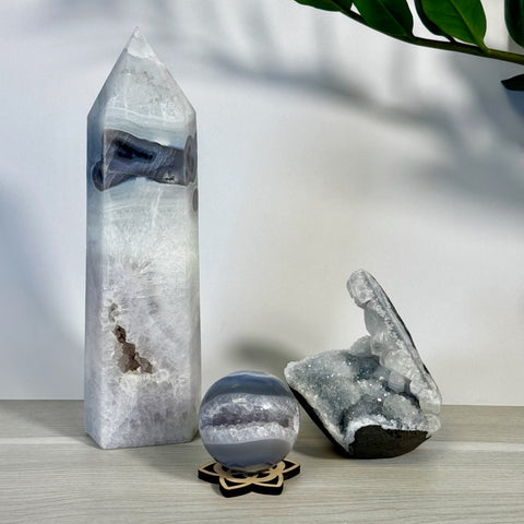 Kenna's Stylized Imperfect Bundle: tall white and grey crystal tower, spherical geode, and raw crystal cluster.