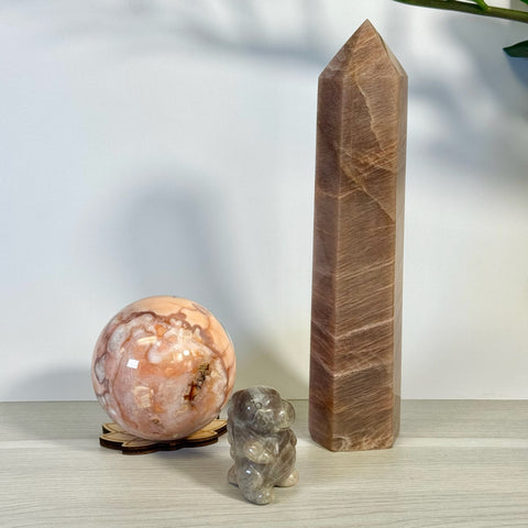 Kenna's Stylized Imperfect Bundle B2: peach-pink crystal sphere, small gray crystal animal, tall brown crystal tower.