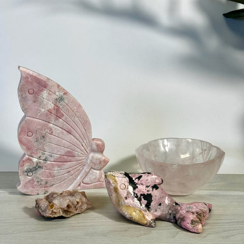 Kenna's Stylized Imperfect Bundle: pink crystal butterfly, fish, raw stone, and clear rose quartz bowl.