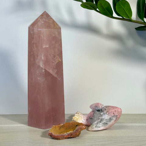 Kenna's Stylized Imperfect Bundle F: Large rose quartz tower, pink and gray crystal, and brown polished stone.