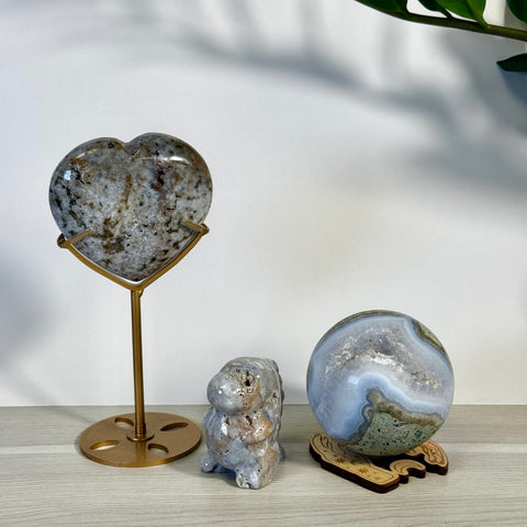Kenna's Stylized Imperfect Bundle: heart, animal, and sphere crystals in natural tones.