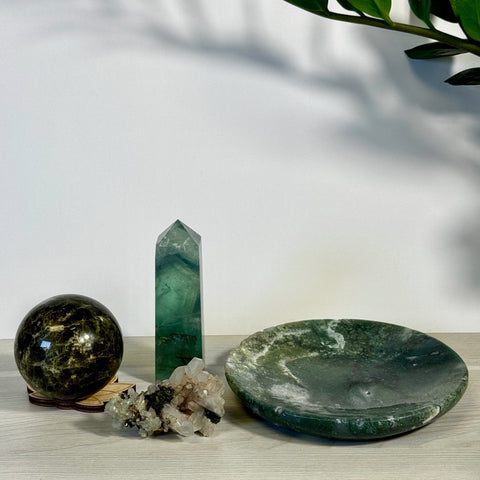 Kenna's Stylized Imperfect Bundle: Dark green crystal sphere, tall green fluorite tower, raw clear quartz cluster, and a green moss agate bowl.