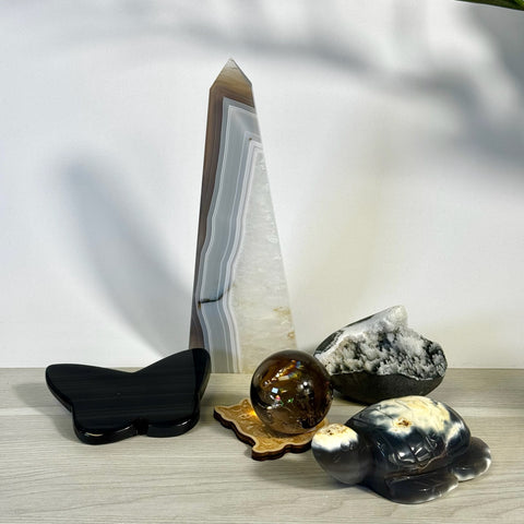 Kenna's Stylized Imperfect Bundle: Black butterfly, smoky sphere, turtle, geode, and tall banded agate crystal.