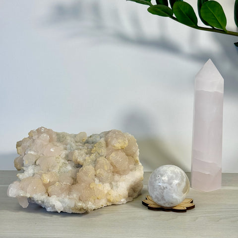 Kenna's Stylized Imperfect Bundle: Pink and white crystal geode, sphere on wood stand, and tall pink crystal tower.