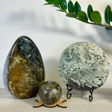 Kenna's Stylized Imperfect Bundle: Teardrop, sphere, and round ocean jasper crystals with green, brown, and white patterns.