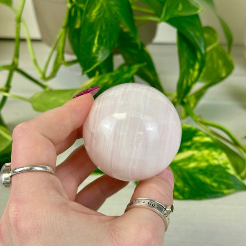 Mangano Calcite Sphere (UV Reactive) 33 2 - Kenna's Crystals from TikTok