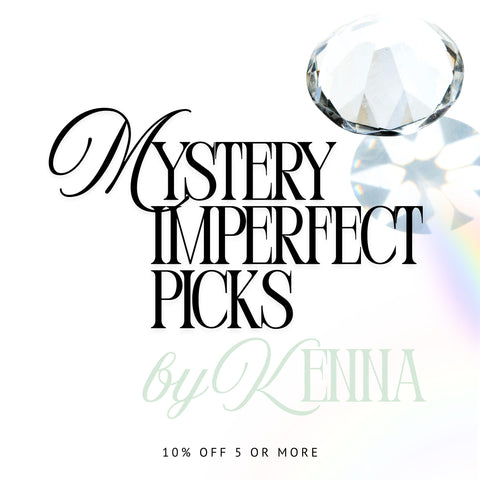 Mystery Imperfect Picks" text in black and green, with a faceted clear crystal casting a rainbow reflection.