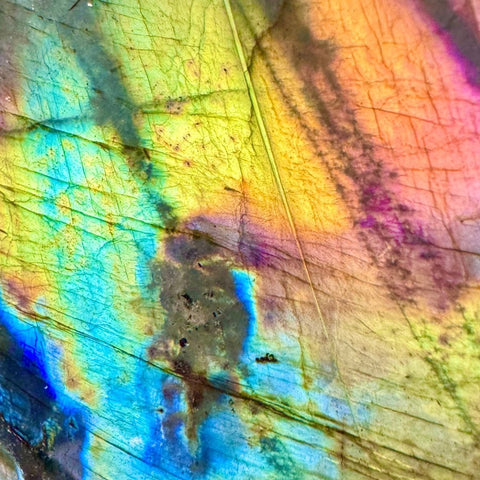 Vibrant labradorite free form with iridescent blues, greens, yellows, oranges, and pinks.