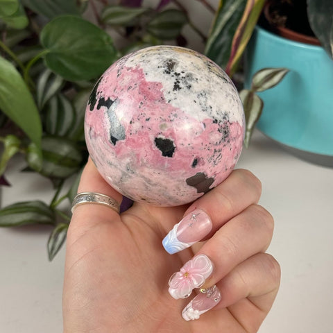 Peruvian Bubble Gum Rhodonite Sphere 211 18 - Kenna's Crystals from TikTok