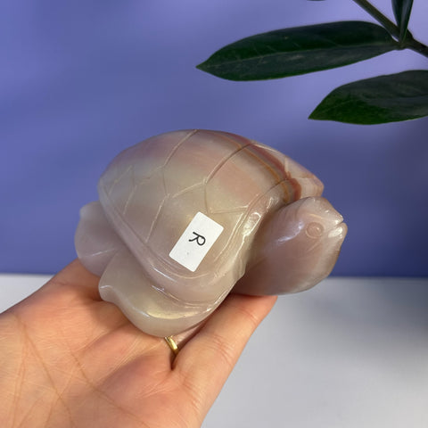 Pink banded onyx turtle carving with smooth, polished finish.