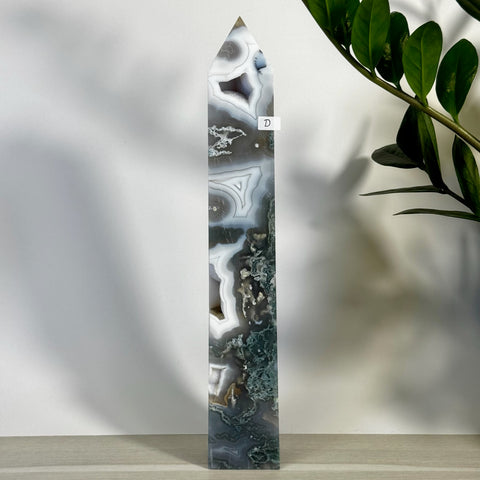 Tall, polished moss agate tower (variant D) with white, grey, and green natural patterns.