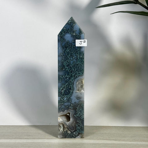 Tall, polished moss agate tower (J2) with intricate green dendritic inclusions and white druzy pockets.