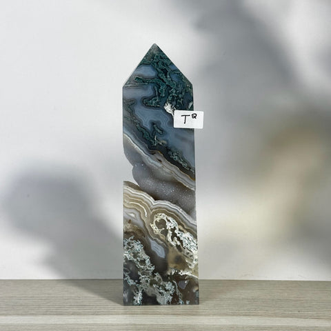 Tall, polished moss agate tower (T2) with green, grey, and white natural patterns.