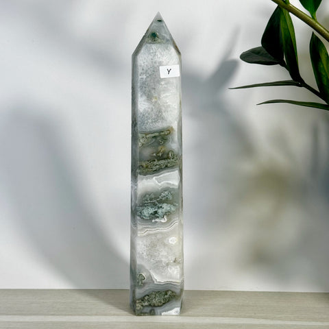 Tall, polished moss agate tower (variant Y) with natural green and white swirling patterns.