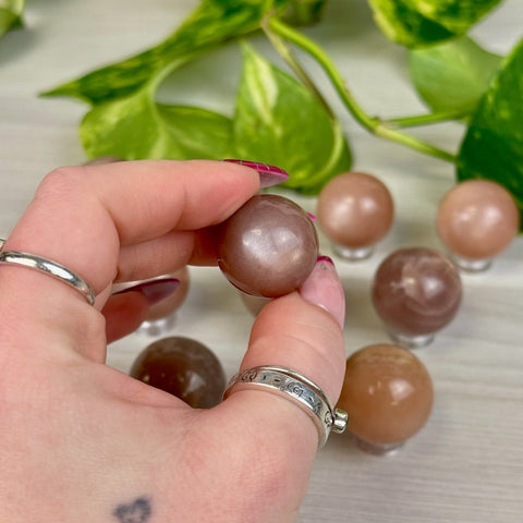 Sunstone In Peach Moonstone Sphere 22 2 - Kenna's Crystals from TikTok