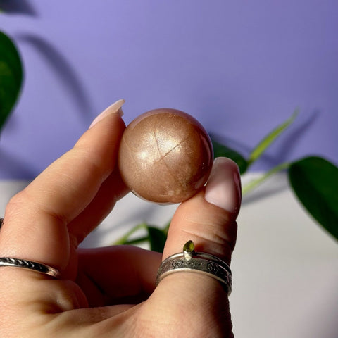 Sunstone In Peach Moonstone Sphere 33 1 - Kenna's Crystals from TikTok