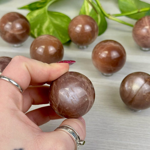 Sunstone In Peach Moonstone Sphere 66 5 - Kenna's Crystals from TikTok