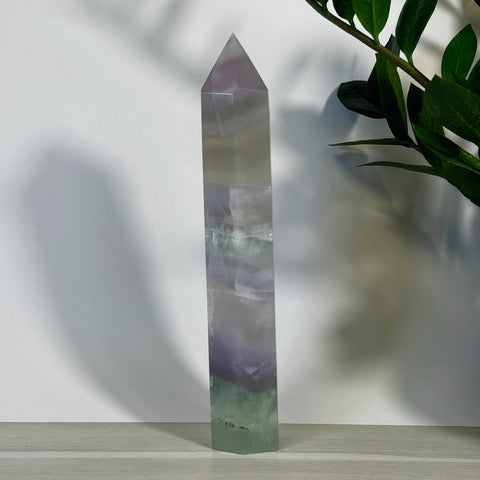 Hand-carved XL Yttrium Fluorite Tower with soft lavender, lilac, and green hues.